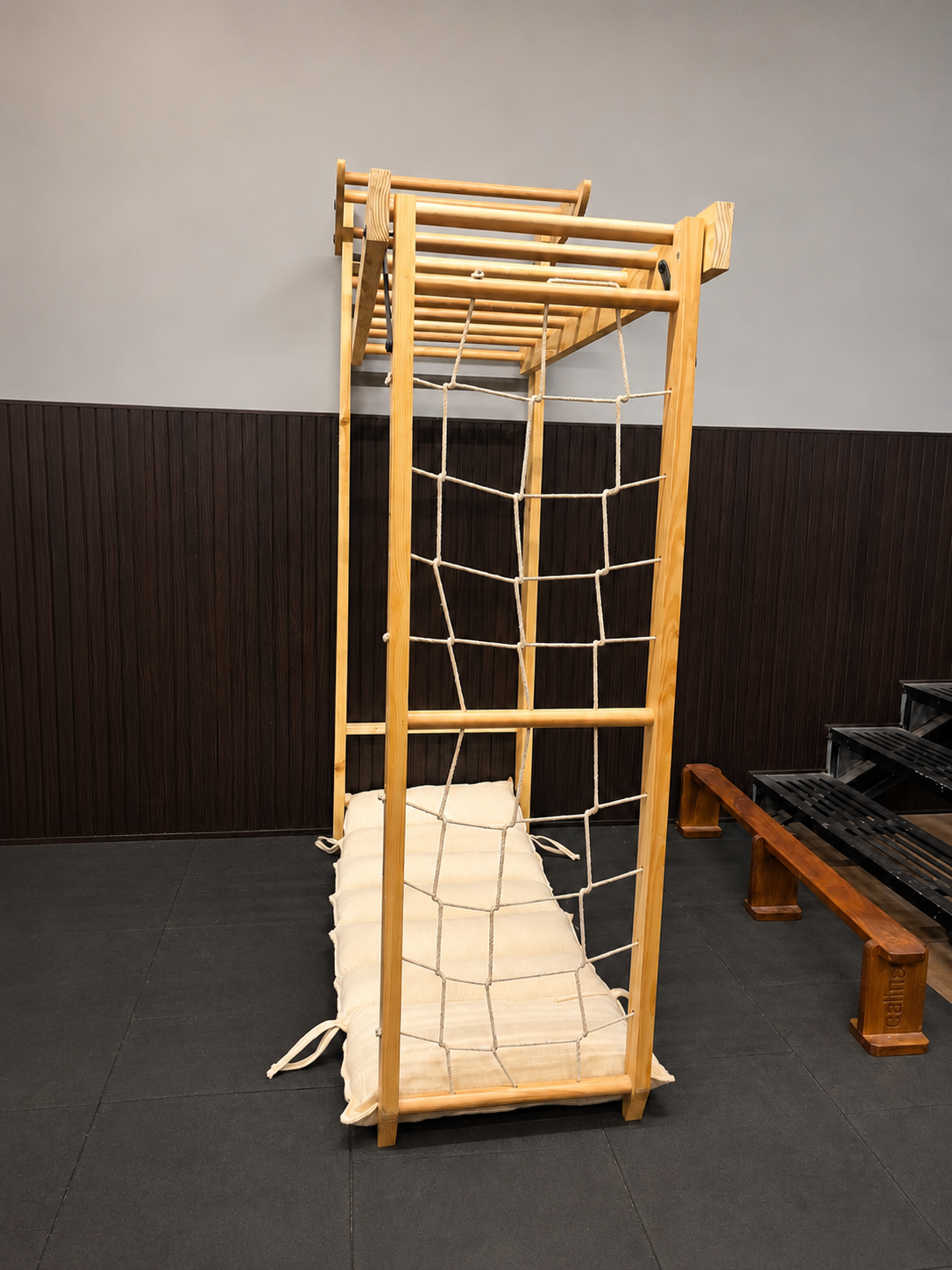 Mattress placed under the Jungle Gym climbing frame